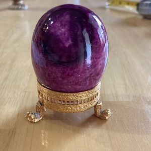 Vintage alabaster maroon hand carved egg with gold tone stand